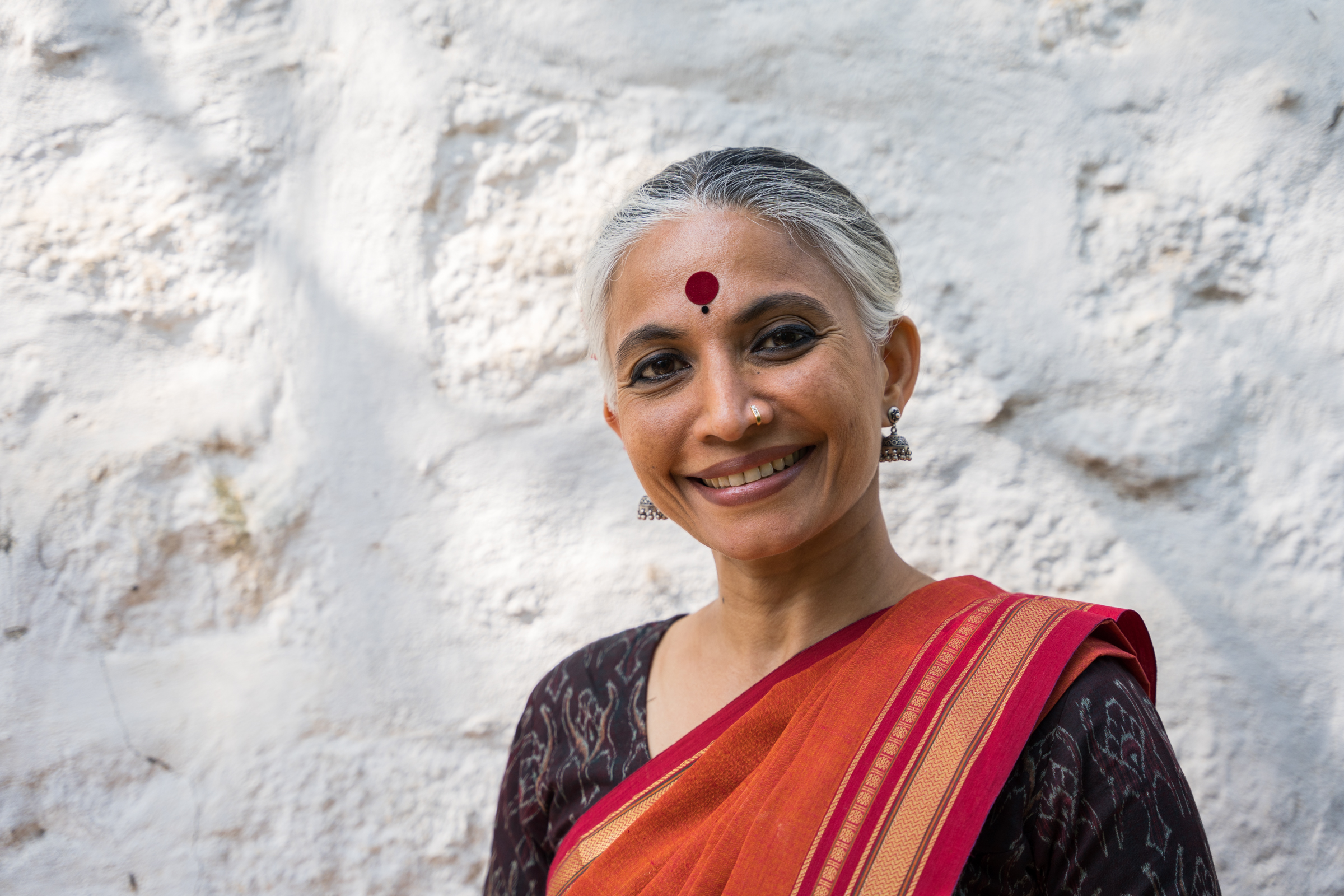 a woman smiling at the camera