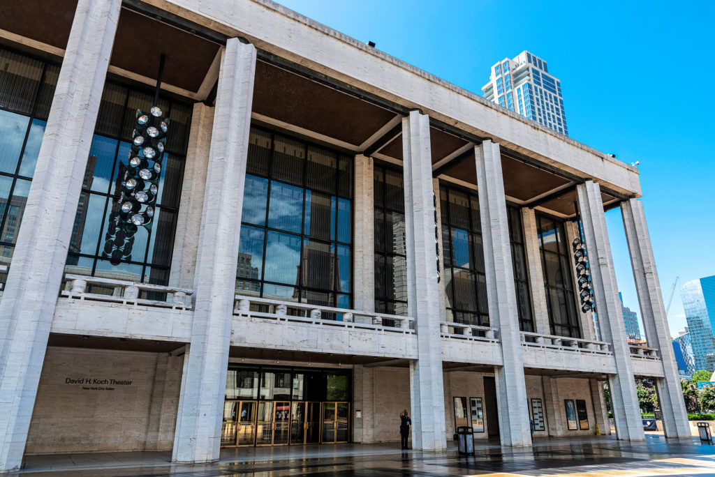 large white building with large pillars and windows